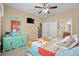 Bedroom featuring ocean themed decor, a television, and a connected bathroom at 709 Shell Creek Circle # 709, North Myrtle Beach, SC 29582