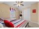 Bedroom featuring two twin beds, a ceiling fan, a closet, and ocean themed decor at 709 Shell Creek Circle # 709, North Myrtle Beach, SC 29582