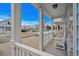 Inviting front porch with white railing, cozy seating, and neighborhood views at 709 Shell Creek Circle # 709, North Myrtle Beach, SC 29582