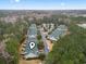 Aerial view of townhouses within a lush, wooded community at 759 Painted Bunting Ct. # A, Murrells Inlet, SC 29576