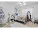 Cozy bedroom with coastal accents, a decorative tree and a fluffy white rug at 759 Painted Bunting Ct. # A, Murrells Inlet, SC 29576