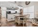 Cozy dining area features stylish lighting, and is adjacent to the modern kitchen at 759 Painted Bunting Ct. # A, Murrells Inlet, SC 29576