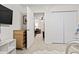 Hallway leading to a bedroom with a ceiling fan and view of additional rooms at 759 Painted Bunting Ct. # A, Murrells Inlet, SC 29576