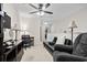 Living room featuring a desk and a black couch at 759 Painted Bunting Ct. # A, Murrells Inlet, SC 29576