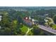 Overhead shot of condo surrounded by lush greenery, showcasing its serene location by the lake at 922 Fairwood Lakes Ln. # 22M, Myrtle Beach, SC 29588