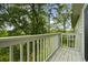 Balcony view with lush green trees and foliage, creating a private outdoor retreat at 922 Fairwood Lakes Ln. # 22M, Myrtle Beach, SC 29588