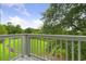 Balcony view showcases a green landscape and blue sky, offering a serene outdoor space at 922 Fairwood Lakes Ln. # 22M, Myrtle Beach, SC 29588