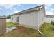 Exterior view of home showing siding, yard, and foundation at 9545 Sullivan Dr., Murrells Inlet, SC 29576