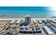 Beautiful aerial view of a beachfront condo building and the Atlantic ocean on a sunny day at 9620 Shore Dr. # C101, Myrtle Beach, SC 29572