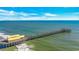 Beautiful daytime view of Apache Pier jutting out into the Atlantic Ocean on a sunny day at 9620 Shore Dr. # C101, Myrtle Beach, SC 29572