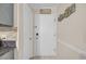 Clean hallway in a well-maintained condo with a view of the tiled kitchen counter at 9620 Shore Dr. # C101, Myrtle Beach, SC 29572