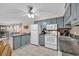 Bright kitchen with ample counter space, modern appliances, and open access to the living room at 9620 Shore Dr. # C101, Myrtle Beach, SC 29572