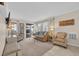 Comfortable living room with lots of natural light and balcony access at 9620 Shore Dr. # C101, Myrtle Beach, SC 29572
