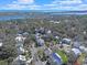 An aerial view of the community showcases homes surrounded by trees, and ocean views on the horizon at 10 Orchard Ave., Murrells Inlet, SC 29576