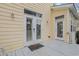 Exterior patio with two chairs and white double doors at 10 Orchard Ave., Murrells Inlet, SC 29576