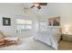 Bright bedroom with vaulted ceiling, patterned bedding, and natural decor at 10 Orchard Ave., Murrells Inlet, SC 29576