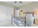 Bedroom with a metal frame bed, neutral walls, closet, and carpeted floors at 10 Orchard Ave., Murrells Inlet, SC 29576