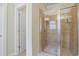 Bathroom featuring a glass door shower with tiled walls at 10 Orchard Ave., Murrells Inlet, SC 29576