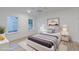 Bright bedroom featuring two windows, hardwood floors and a ceiling fan at 1054 East Isle Of Palms Ave., Myrtle Beach, SC 29579