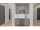 Stylish wet bar featuring custom cabinetry, a built-in wine fridge, a sink, and elegant lighting for entertaining at 1054 East Isle Of Palms Ave., Myrtle Beach, SC 29579