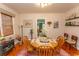 Warm dining room with a round wooden table and charming decor at 1105 Palmetto St., Georgetown, SC 29440