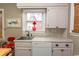 Kitchen area showcasing the sink and dishwasher, plus ample counter space at 1105 Palmetto St., Georgetown, SC 29440