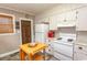 Bright kitchen featuring white appliances, cabinets, and updated countertops at 1105 Palmetto St., Georgetown, SC 29440