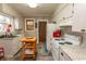 Functional kitchen with white cabinetry, granite countertops, and modern appliances at 1105 Palmetto St., Georgetown, SC 29440