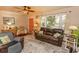 Airy living room with warm wood accents, a cozy sofa, and a patterned area rug at 1105 Palmetto St., Georgetown, SC 29440