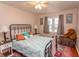 Inviting bedroom with a bed, hardwood floors, a window and neutral decor at 1105 Palmetto St., Georgetown, SC 29440