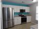 Kitchen with stainless steel appliances and white cabinets at 113 Butkus Dr. # 3, Myrtle Beach, SC 29588