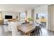 Open floor plan shows a large living area flowing into the bright dining area and kitchen at 124 Shucking St., Myrtle Beach, SC 29588