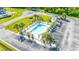 Aerial view of a community pool with palm trees and ample parking at 131 Waypoint Ridge Ave. # Q-14, Little River, SC 29566