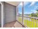 Balcony overlooking beautiful lake view with a fountain at 131 Waypoint Ridge Ave. # Q-14, Little River, SC 29566