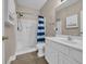 Bathroom featuring shower-tub combination and white vanity at 131 Waypoint Ridge Ave. # Q-14, Little River, SC 29566