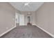 Bedroom featuring carpeting and arched entryways at 131 Waypoint Ridge Ave. # Q-14, Little River, SC 29566