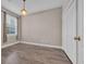 Bright bedroom with hardwood floors, closet and natural light from the window at 131 Waypoint Ridge Ave. # Q-14, Little River, SC 29566