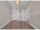 Bedroom with light-colored walls, closet and white trim at 131 Waypoint Ridge Ave. # Q-14, Little River, SC 29566