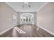Open concept living area with a bay window, lots of light, and wood-look flooring at 131 Waypoint Ridge Ave. # Q-14, Little River, SC 29566