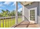 Enjoy relaxing on the screened porch with views of the pond and nature at 131 Waypoint Ridge Ave. # Q-14, Little River, SC 29566