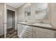 Bathroom featuring a dual sink vanity with two mirrors, and modern fixtures at 1310 Rabbit Ln., Conway, SC 29526