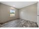 Bright bedroom features stylish wood flooring, neutral walls, and a window for natural light at 1310 Rabbit Ln., Conway, SC 29526