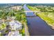 Scenic aerial view of a waterway with bridge, golf course, and community residences at 1352 Villa Marbella Ct. # 1-304, Myrtle Beach, SC 29572