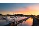 Boats docked at a marina with a colorful sky in the background at 1352 Villa Marbella Ct. # 1-304, Myrtle Beach, SC 29572