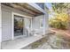 A relaxing outdoor patio featuring a table and chairs, perfect for enjoying the outdoors at 1356 Glenns Bay Rd. # 203K, Myrtle Beach, SC 29575