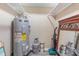 Water heater and cleaning supplies are conveniently stored in this storage room at 1356 Glenns Bay Rd. # 203K, Myrtle Beach, SC 29575