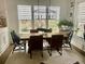 Bright dining room featuring large windows, modern lighting, and comfortable seating at 1391 Peterson St., Myrtle Beach, SC 29577