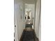 Bright hallway featuring hardwood floors, neutral paint, and open sightlines to other rooms at 1391 Peterson St., Myrtle Beach, SC 29577