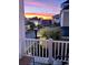 Stunning sunset view from a balcony overlooking a picturesque neighborhood at 1391 Peterson St., Myrtle Beach, SC 29577