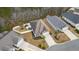 A high angle aerial view of the home and back yard with a white fence at 1442 Chanson Ct., Little River, SC 29566